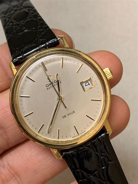 omega deville 18k.